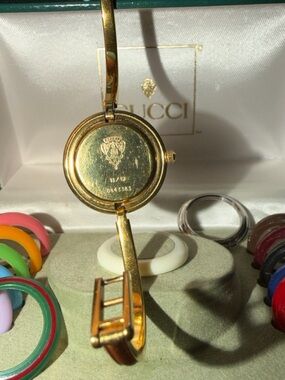 Gucci Gold Bangle Watch with Interchangeable Colored Bezels